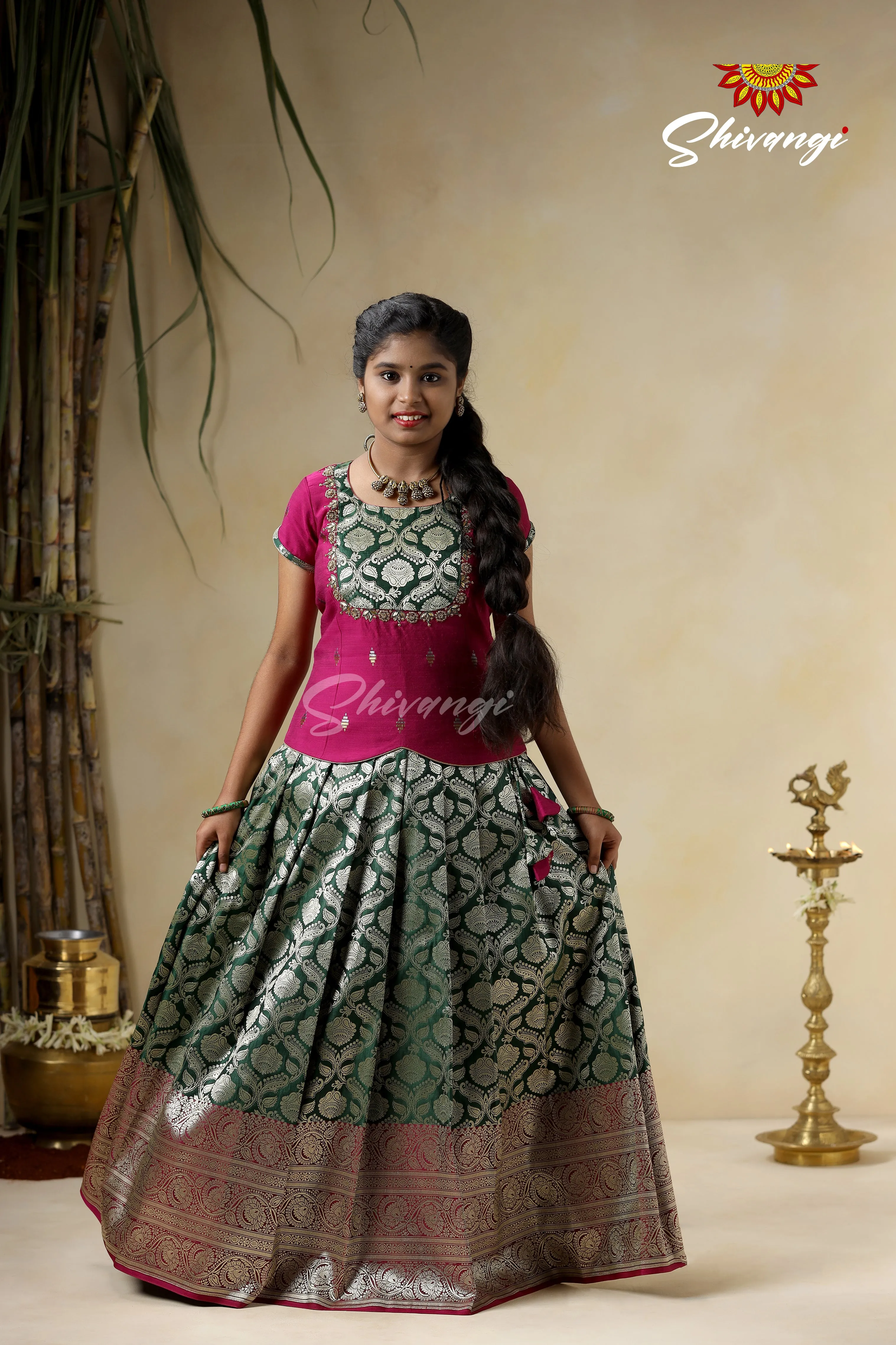 Embroidery Pattu Pavadai Designs for Girls - Green Satin Diya