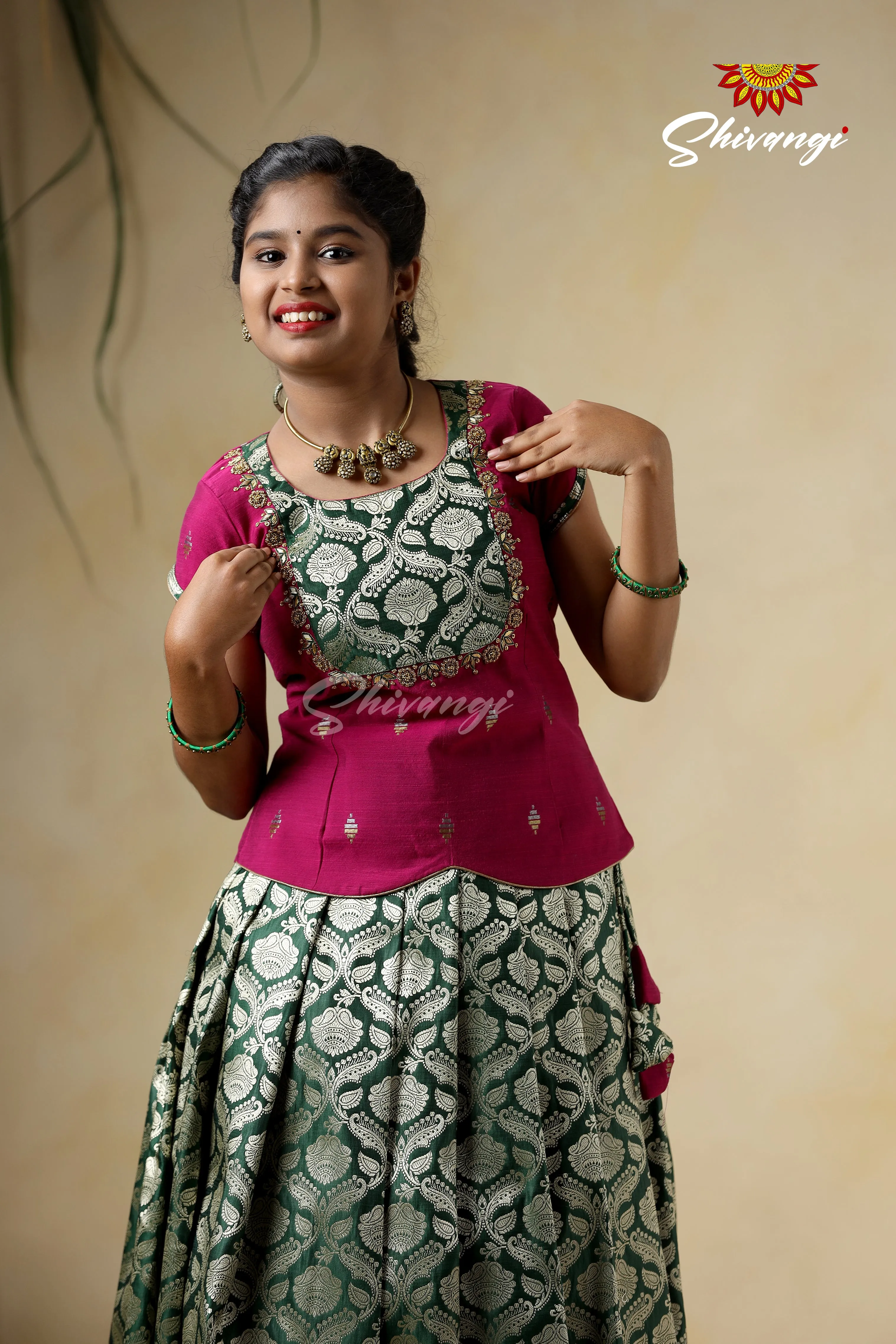 Embroidery Pattu Pavadai Designs for Girls - Green Satin Diya