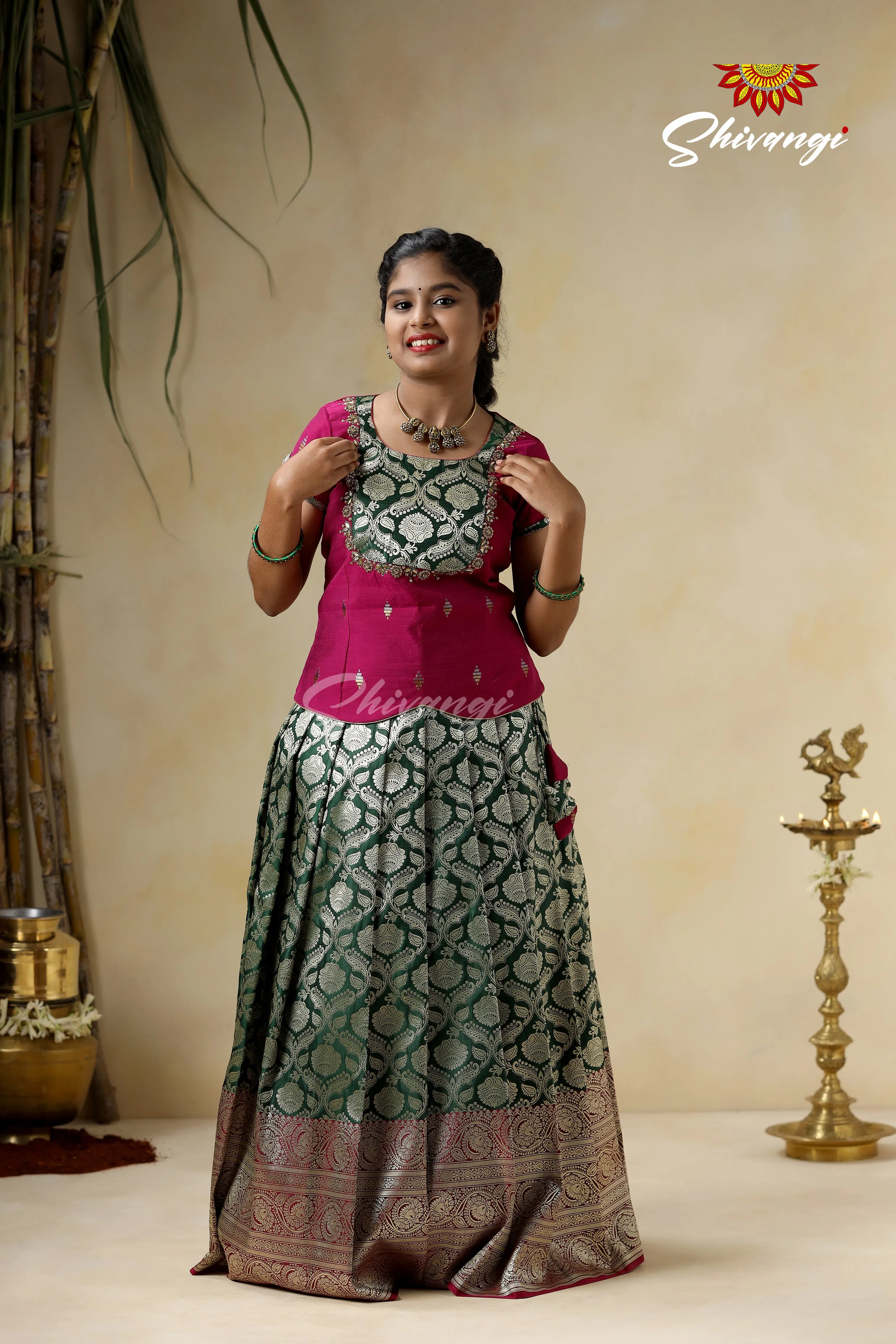 Embroidery Pattu Pavadai Designs for Girls - Green Satin Diya