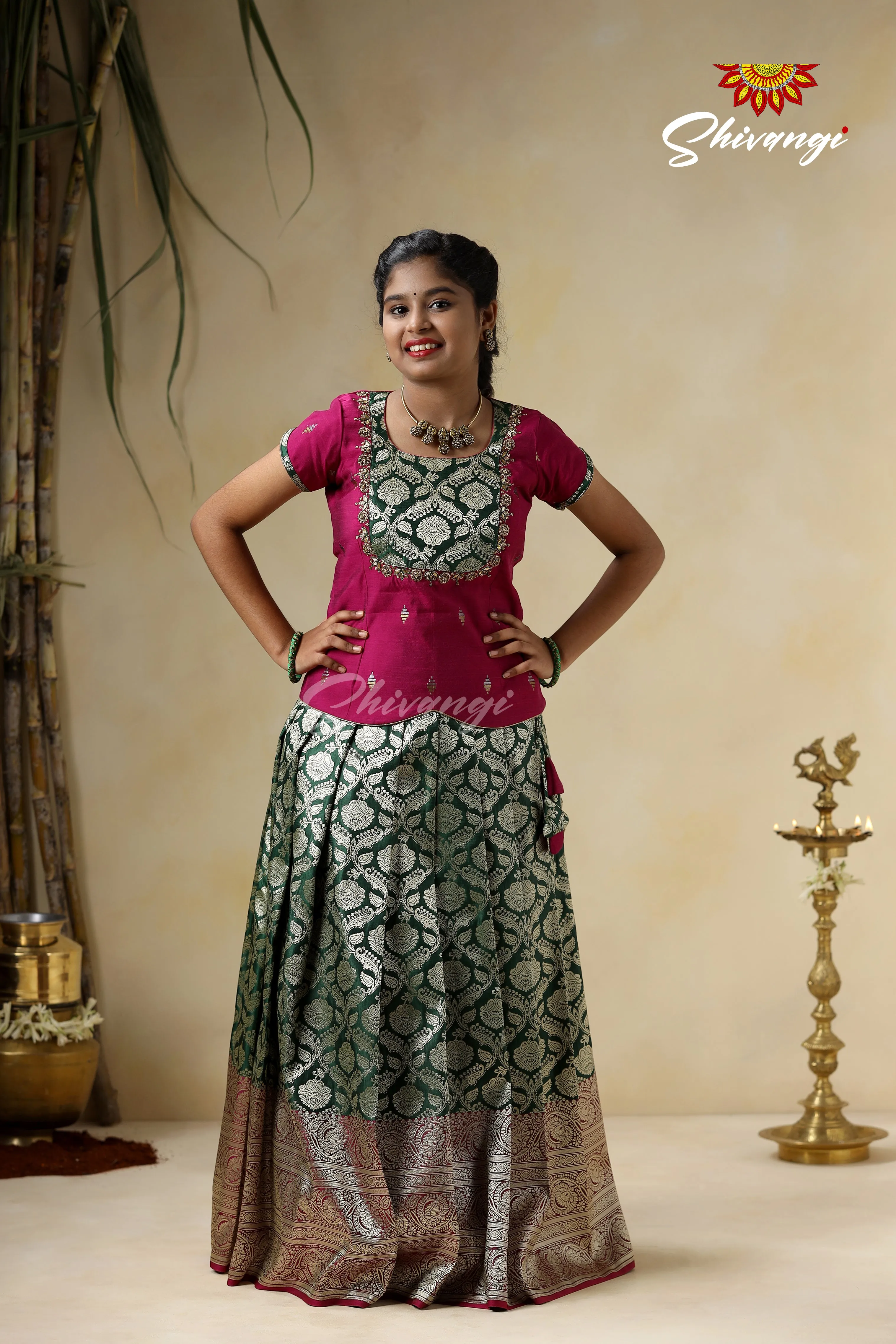 Embroidery Pattu Pavadai Designs for Girls - Green Satin Diya