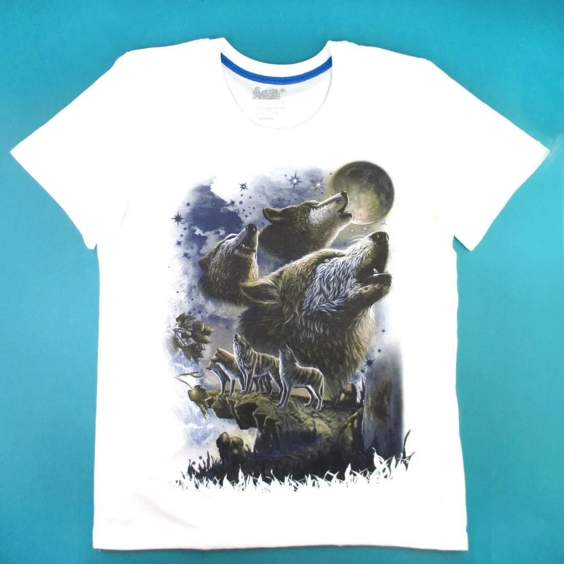 Pack of Wolves Howling at the Moon Print Graphic Tee in White | DOTOLY